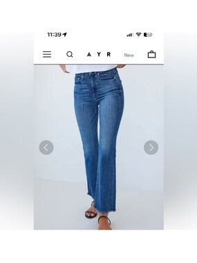 AYR The Bomb Pop blue denim high-rise straight-leg jeans with a raw hem.